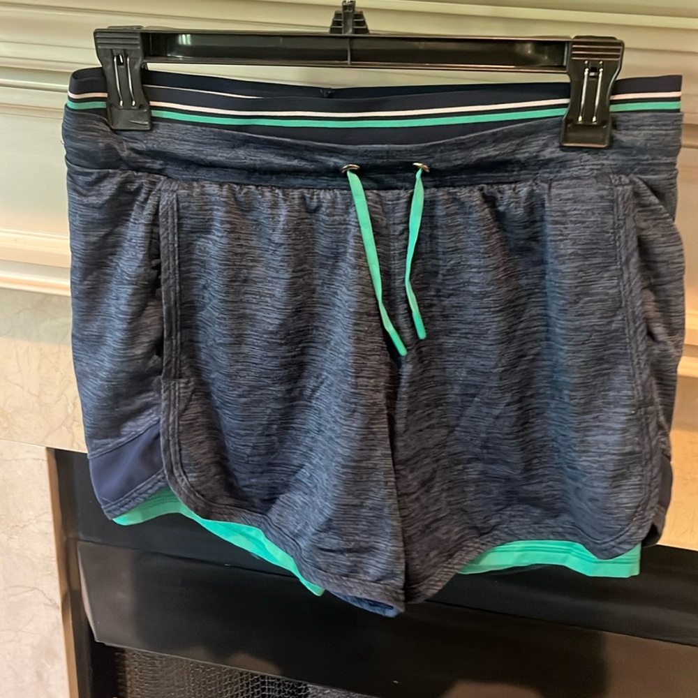 Size M athletic shorts. Worn several times. Listing# 480